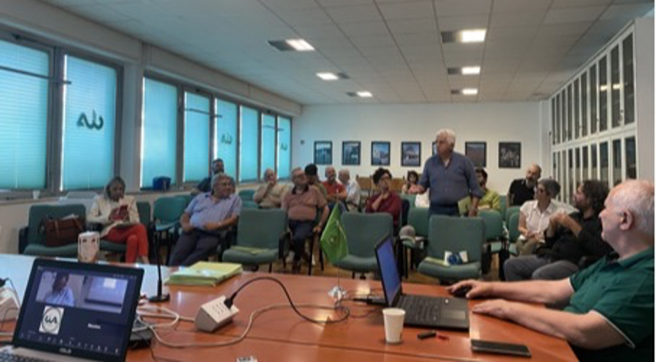In-person attendees at the olive oil demonstrator workshop. Computers are also visible